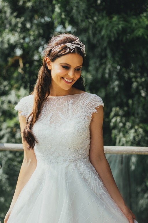 Catherine Peck modelling our stick on bra in an illusion wedding dress