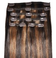 Dark brown hair with caramel highlights